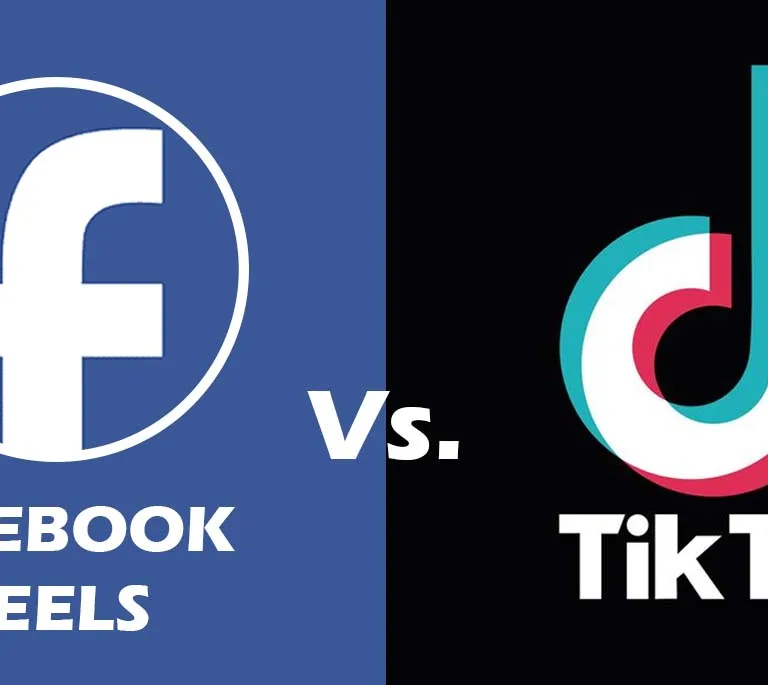 Smartphones displaying Facebook Reels and TikTok logos side by side, representing a comparison for content creators.